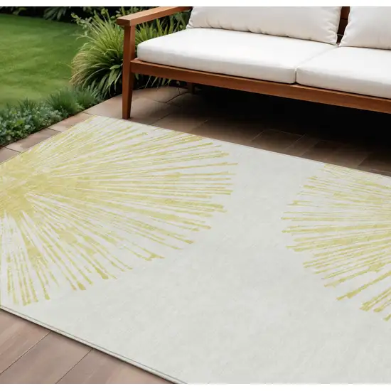 Beige And Ivory Abstract Washable Indoor Outdoor Area Rug Photo 1