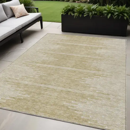 Beige And Ivory Abstract Washable Indoor Outdoor Area Rug Photo 1