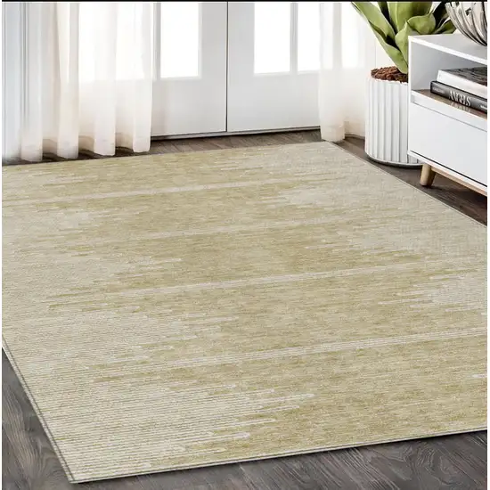 Beige And Ivory Abstract Washable Indoor Outdoor Area Rug Photo 9