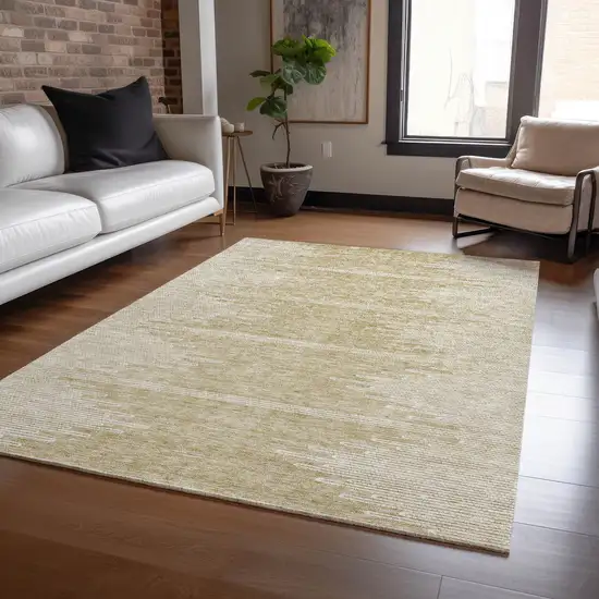 Beige And Ivory Abstract Washable Indoor Outdoor Area Rug Photo 9