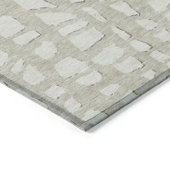 Beige And Ivory Abstract Washable Indoor Outdoor Area Rug Photo 4