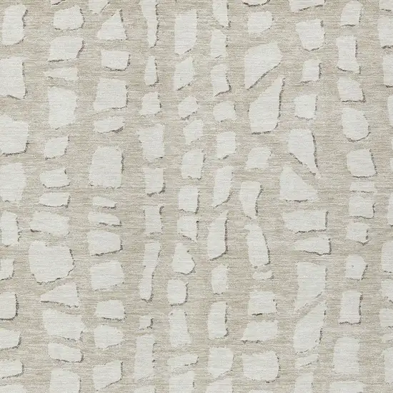 Beige And Ivory Abstract Washable Indoor Outdoor Area Rug Photo 4