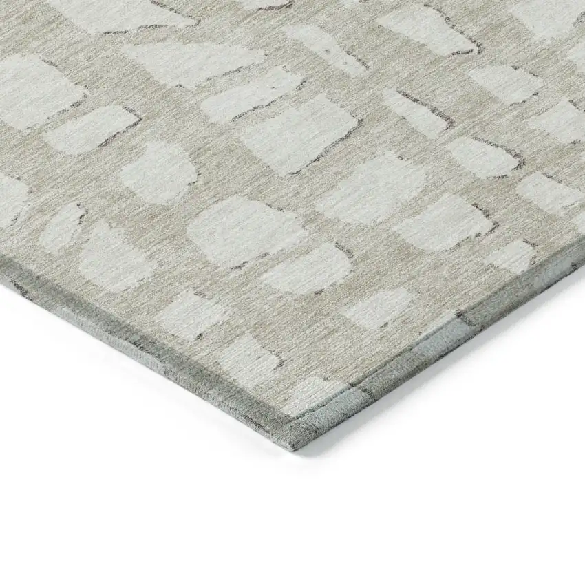 Beige And Ivory Abstract Washable Indoor Outdoor Area Rug Photo 3