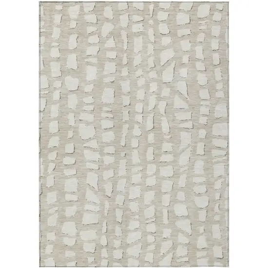 Beige And Ivory Abstract Washable Indoor Outdoor Area Rug Photo 1