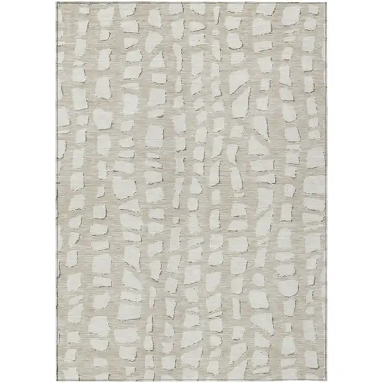 Beige And Ivory Abstract Washable Indoor Outdoor Area Rug Photo 1