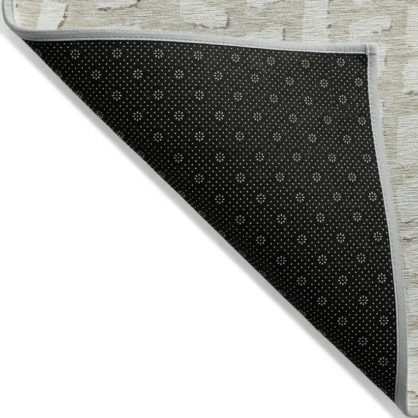 Beige And Ivory Abstract Washable Indoor Outdoor Area Rug Photo 2