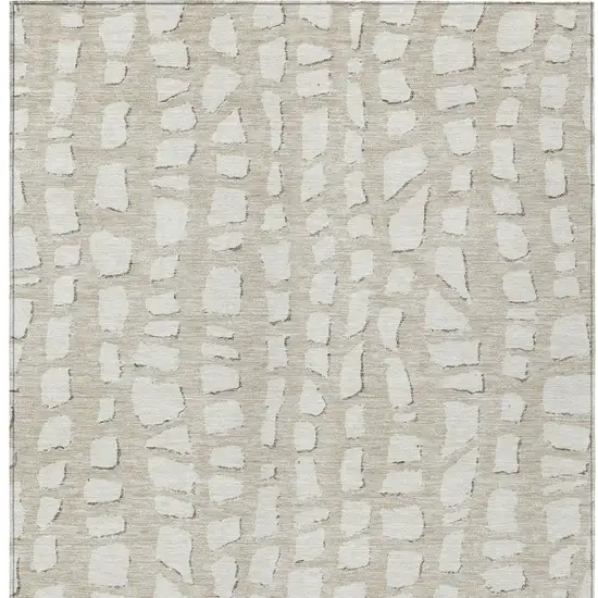 Beige And Ivory Abstract Washable Indoor Outdoor Area Rug Photo 4