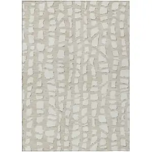 Photo of Beige And Ivory Abstract Washable Indoor Outdoor Area Rug