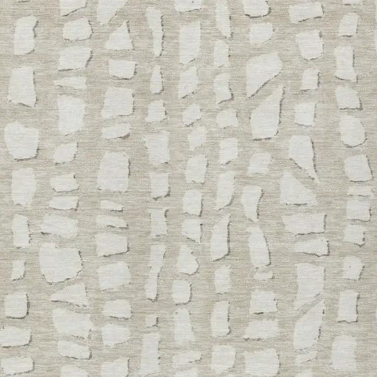 Beige And Ivory Abstract Washable Indoor Outdoor Area Rug Photo 4