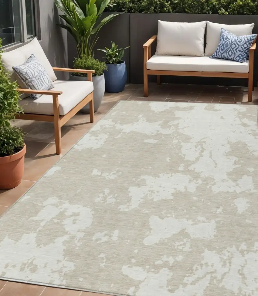 Beige And Ivory Abstract Washable Indoor Outdoor Area Rug Photo 1