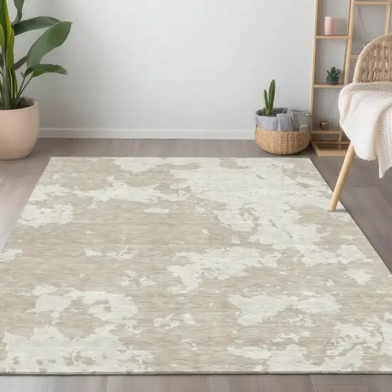 Beige And Ivory Abstract Washable Indoor Outdoor Area Rug Photo 9