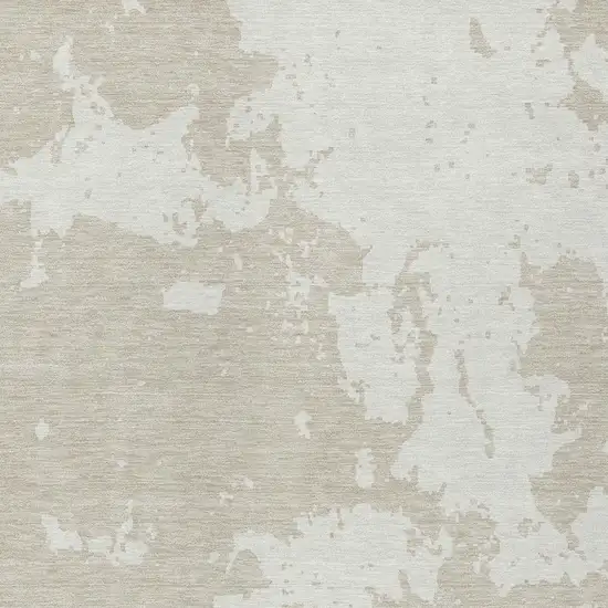 Beige And Ivory Abstract Washable Indoor Outdoor Area Rug Photo 6