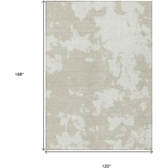Beige And Ivory Abstract Washable Indoor Outdoor Area Rug Photo 3
