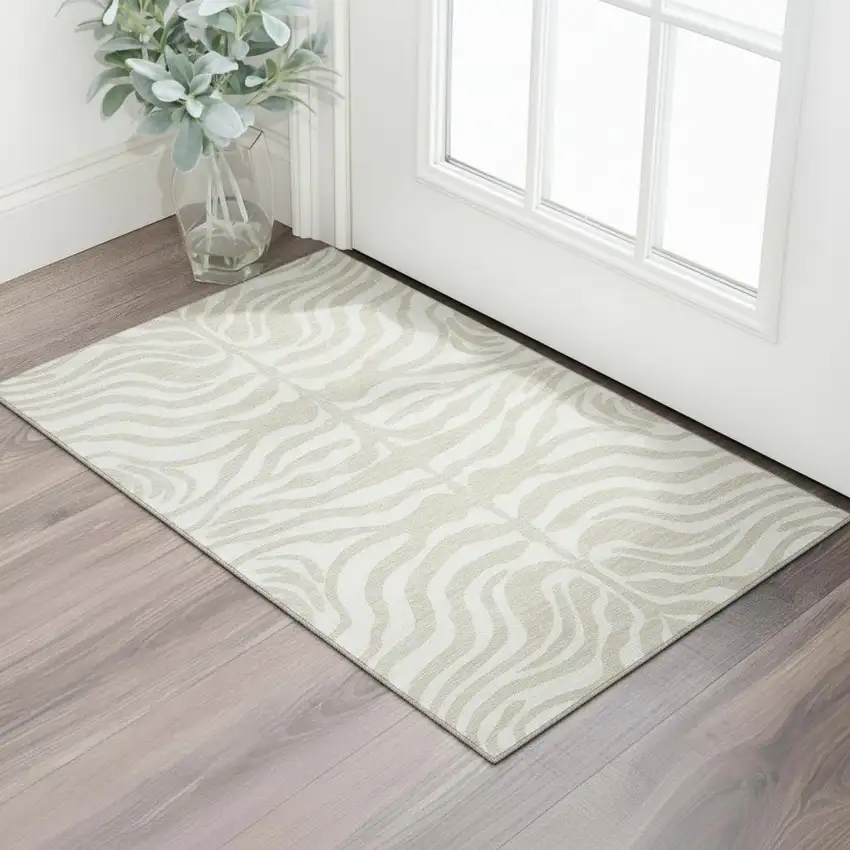Beige And Ivory Animal Print Washable Area Rug With UV Protection Photo 1
