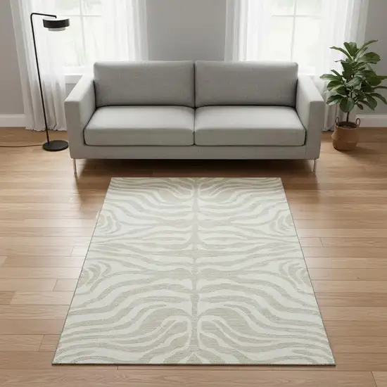 Beige And Ivory Animal Print Washable Area Rug With UV Protection Photo 2