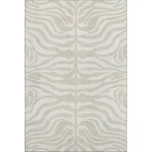 Photo of Beige And Ivory Animal Print Washable Area Rug With UV Protection