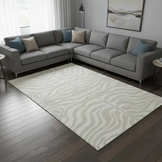 Beige And Ivory Animal Print Washable Area Rug With UV Protection Photo 2