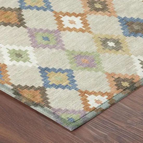 Beige And Ivory Aztec Washable Indoor Outdoor Area Rug Photo 5