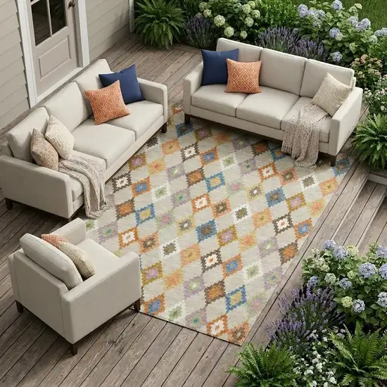 Beige And Ivory Aztec Washable Indoor Outdoor Area Rug Photo 1