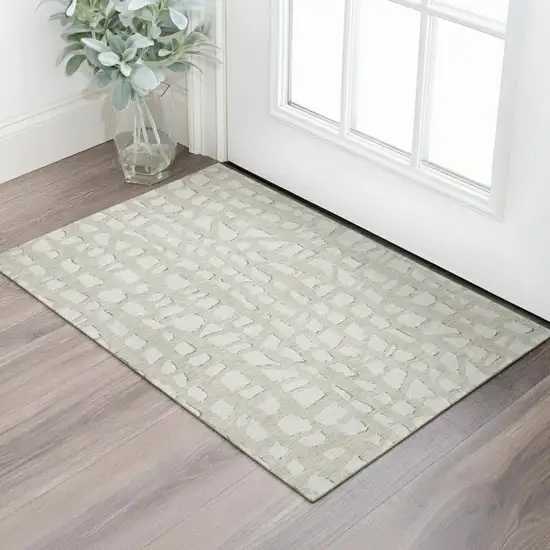 Beige And Ivory Cobblestone Washable Area Rug With UV Protection Photo 1