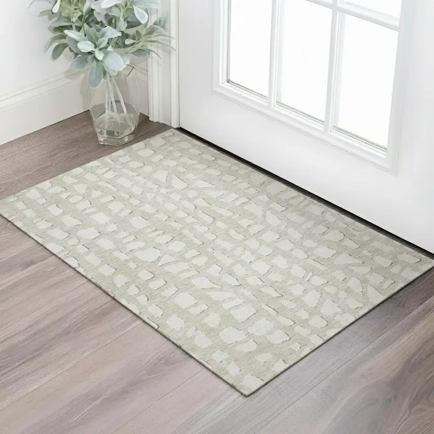 Beige And Ivory Cobblestone Washable Area Rug With UV Protection Photo 1