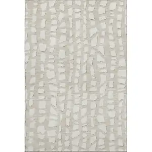 Photo of Beige And Ivory Cobblestone Washable Area Rug With UV Protection