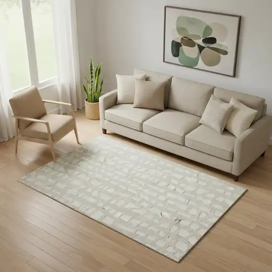 Beige And Ivory Cobblestone Washable Area Rug With UV Protection Photo 1