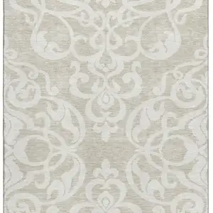 Photo of Beige And Ivory Damask Washable Area Rug With UV Protection