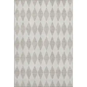 Photo of Beige And Ivory Diamond Washable Area Rug With UV Protection