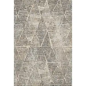 Photo of Beige And Ivory Diamond Washable Area Rug With UV Protection