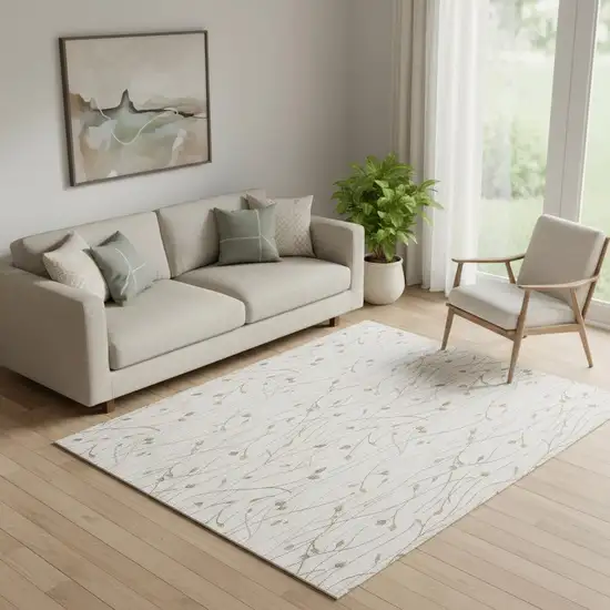 Beige And Ivory Floral Area Rug Photo 1