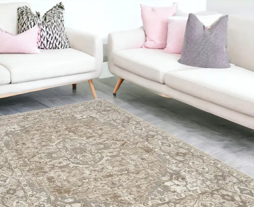 Beige And Ivory Floral Distressed Area Rug Photo 1