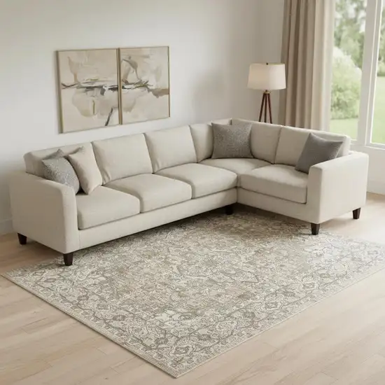 Beige And Ivory Floral Distressed Area Rug Photo 1