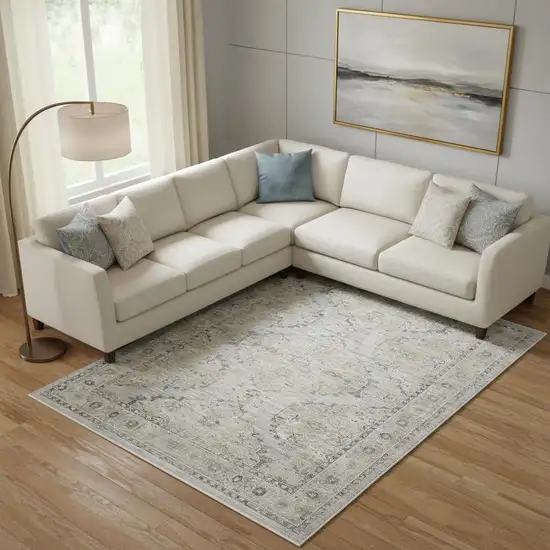 Beige And Ivory Floral Distressed Area Rug Photo 1