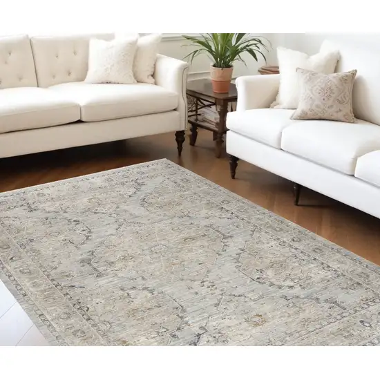 Beige And Ivory Floral Distressed Area Rug Photo 1