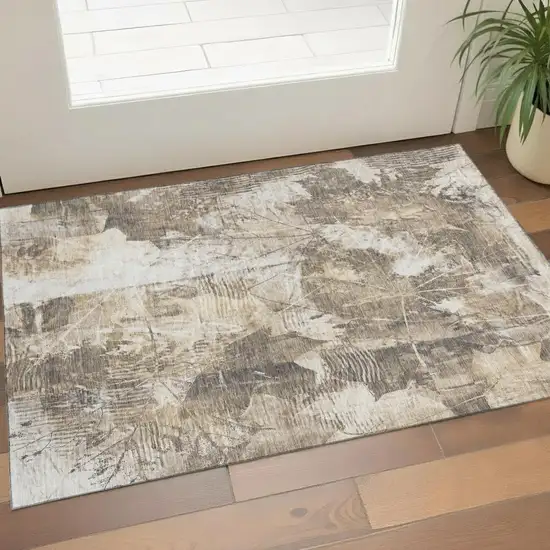 Beige And Ivory Floral Washable Area Rug With UV Protection Photo 1