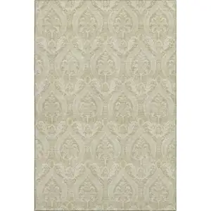Photo of Beige And Ivory Floral Washable Area Rug With UV Protection