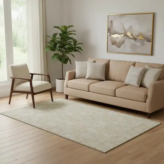 Beige And Ivory Floral Washable Area Rug With UV Protection Photo 1