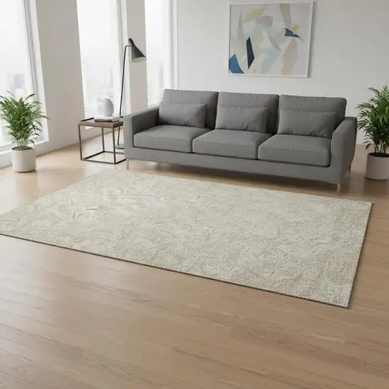 Beige And Ivory Floral Washable Area Rug With UV Protection Photo 1