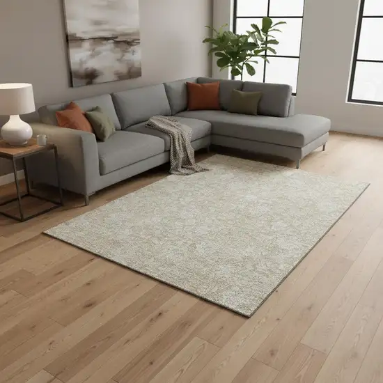 Beige And Ivory Floral Washable Area Rug With UV Protection Photo 1