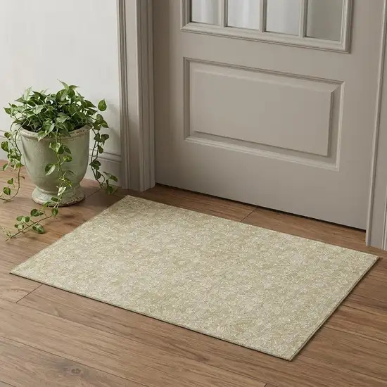 Beige And Ivory Floral Washable Area Rug With UV Protection Photo 1