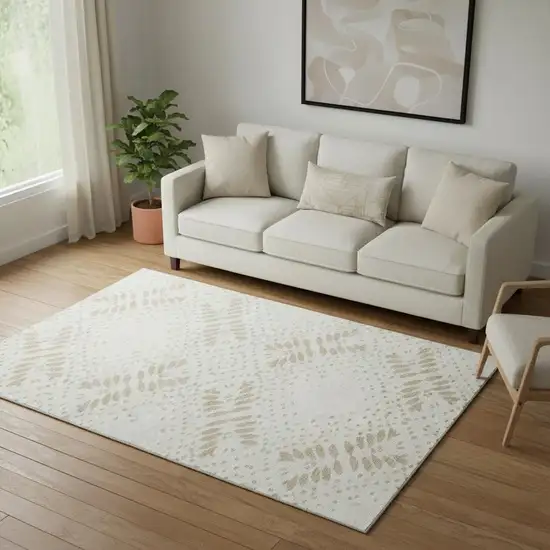 Beige And Ivory Floral Washable Area Rug With UV Protection Photo 1