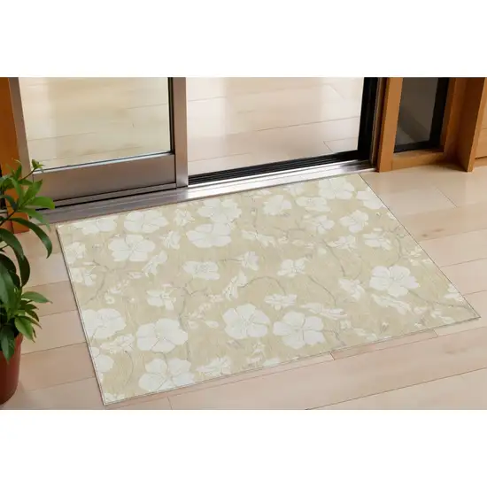 Beige And Ivory Floral Washable Indoor Outdoor Area Rug Photo 1