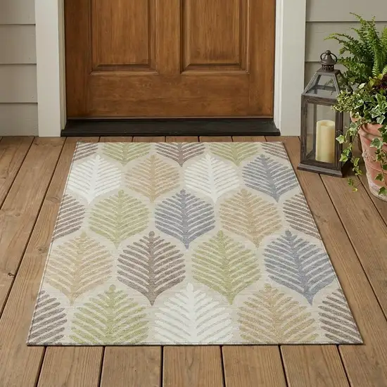 Beige And Ivory Floral Washable Indoor Outdoor Area Rug Photo 1