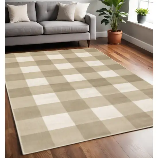 Beige And Ivory Geometric Power Loom Stain Resistant Area Rug Photo 1