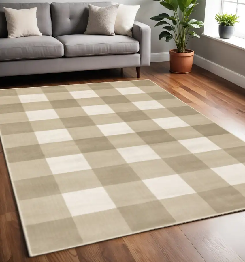 Beige And Ivory Geometric Power Loom Stain Resistant Area Rug Photo 1