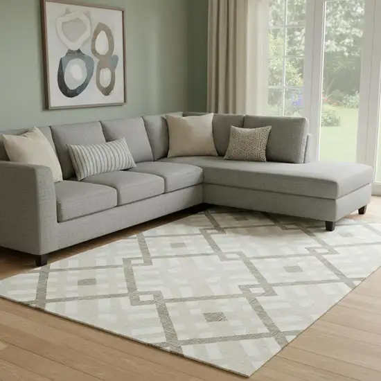 Beige And Ivory Geometric Washable Area Rug With UV Protection Photo 1