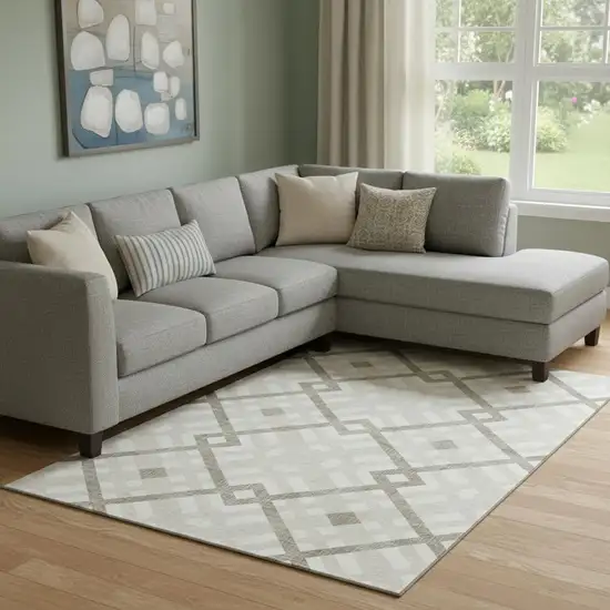 Beige And Ivory Geometric Washable Area Rug With UV Protection Photo 1