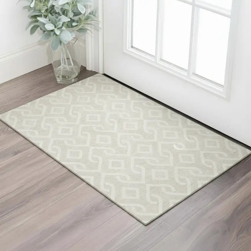 Beige And Ivory Geometric Washable Area Rug With UV Protection Photo 1