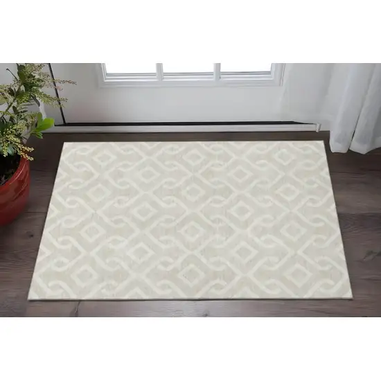 Beige And Ivory Geometric Washable Area Rug With UV Protection Photo 2